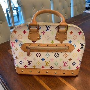 Authentic Louis Vuitton Alma handbag. White w. color monogram. Limited Edition.